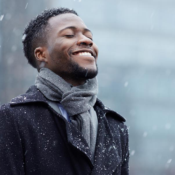Happy-man-in-snowfall---canva_web_small2